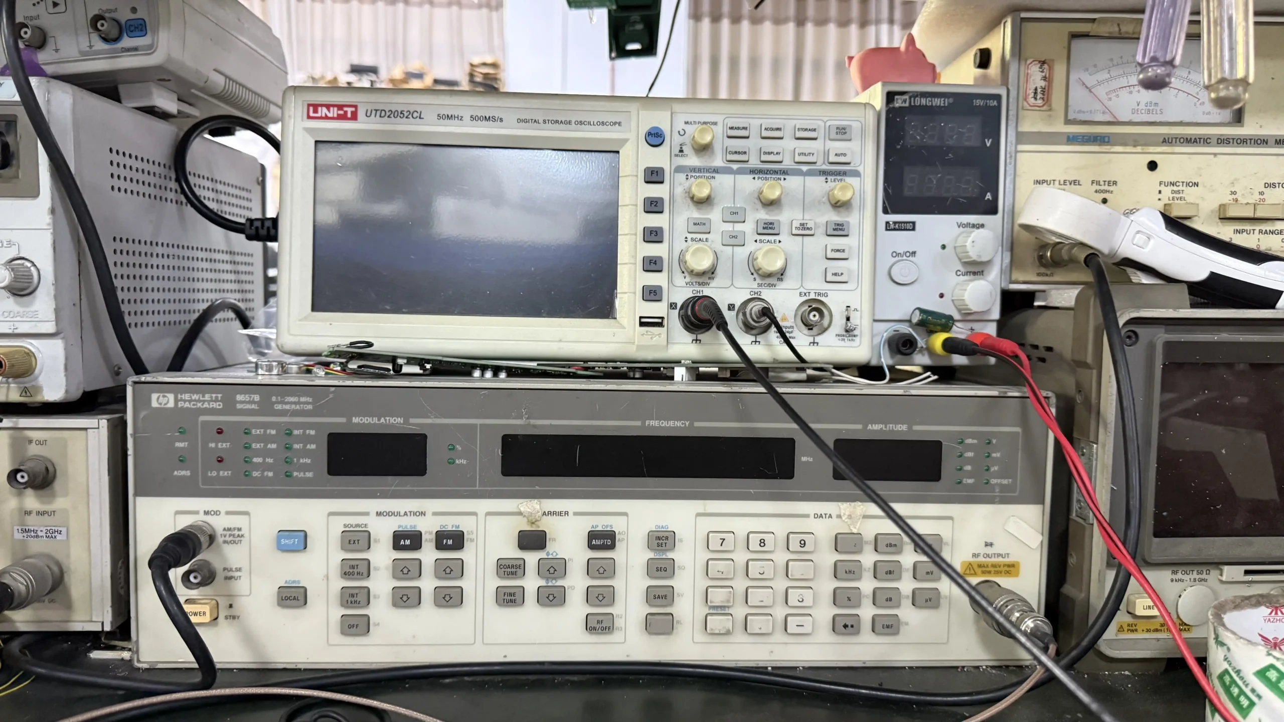 RF signal generator and oscilloscope testing for wireless microphone calibration